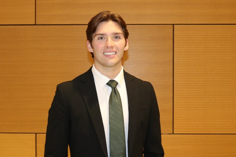 Headshot of Aidan M., Financeable student